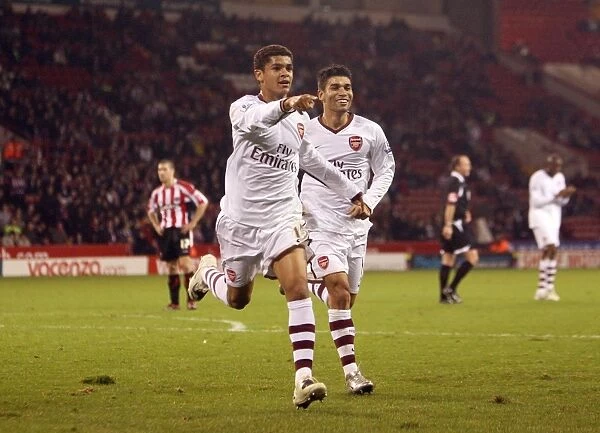Denilson and Eduardo: Arsenal's Triumphant Moment after Scoring the Third Goal against Sheffield United in the Carling Cup
