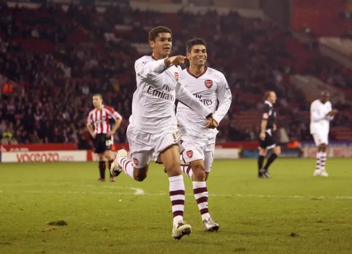 Framed Print : Denilson and Eduardo: Arsenal's Triumphant Moment after Scoring the Third Goal against Sheffield United in the Carling Cup Framed Print : Denilson and Eduardo: Arsenal's Triumphant Moment after Scoring the Third Goal against Sheffield United in the Carling Cup