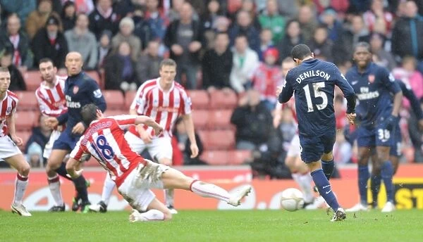Denilson shoots past Dean Whitehead to score the Arsenal goal. Stoke City 3: 1 Arsenal