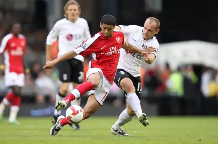 Framed Print : Denilson vs. Murphy: A Battle at Craven Cottage - Fulham Edge Past Arsenal 1-0 in Premier League