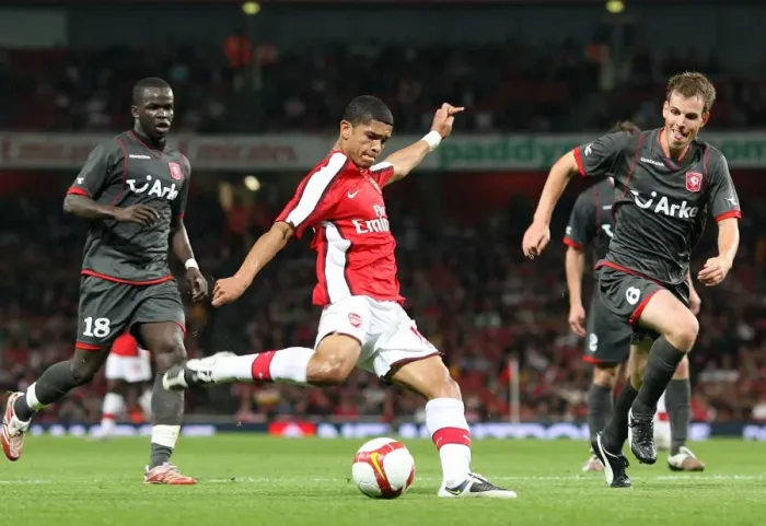 Framed Print : Denilson vs. Wout Brama: Arsenal's Dominance over FC Twente in the UEFA Champions League (4-0) Framed Print : Denilson vs. Wout Brama: Arsenal's Dominance over FC Twente in the UEFA Champions League (4-0)