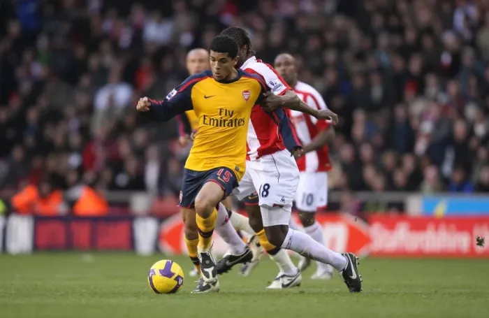 Framed Print : Denilson's Defiant Performance: Arsenal's 1:2 Victory over Stoke City at The Britannia Stadium, November 2008