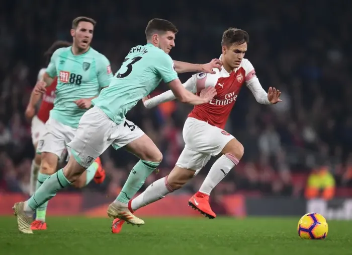 Framed Print : Denis Suarez Breaks Past Bournemouth's Chris Mepham in Arsenal's Premier League Clash