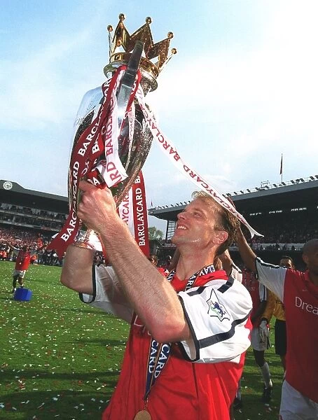 Dennis Bergkamp with the F.A.Barclaycard Premiership Trophy