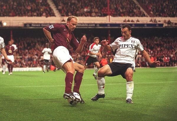 Dennis Bergkamp Scores Against Steed Malbranque: Arsenal's 4-1 Victory Over Fulham in the FA Premier League, August 2005