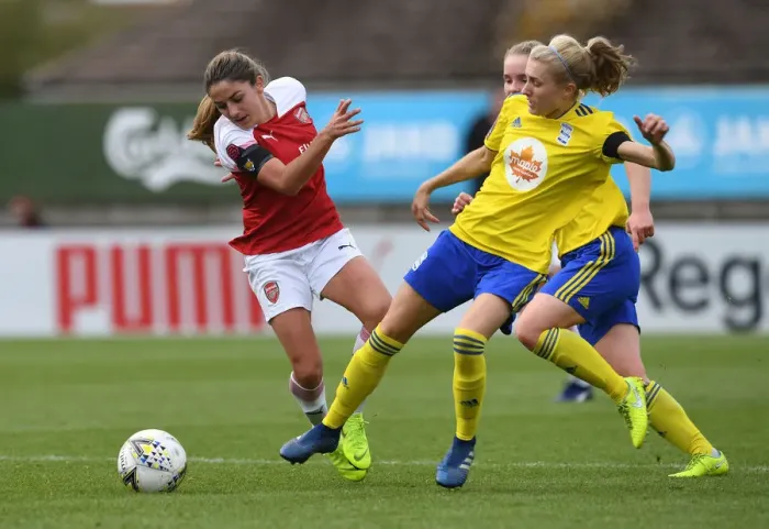 Framed Print : Determination Clash: Van de Donk vs. Folils - A Battle of Wills in Arsenal Women's Football