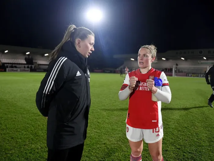 Framed Print : Determined Duo: McCabe and Little's Post-Match Moment at Arsenal Women vs Brighton Hove Albion (2021-22)