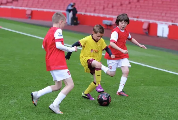Framed Print : Determined Young Gunners Amidst 1:2 Defeat: Arsenal vs Aston Villa, 2011