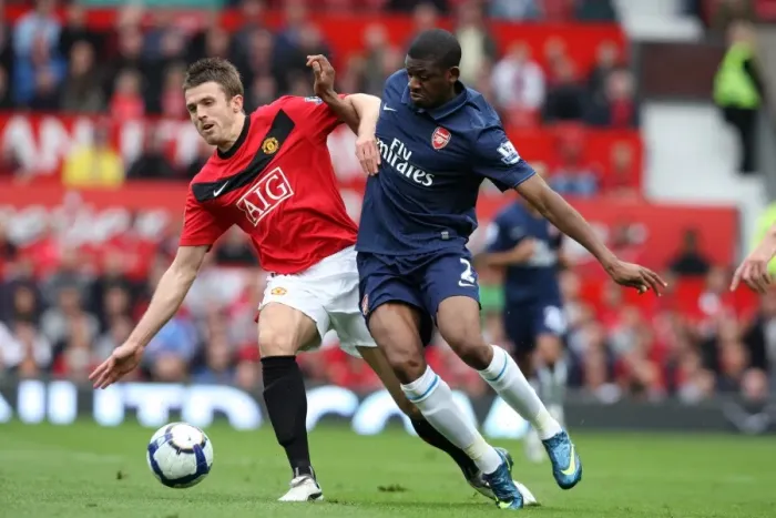 Framed Print : Diaby vs. Carrick: A Battle at Old Trafford - Manchester United Edge Past Arsenal 2:1 in Premier League Framed Print : Diaby vs. Carrick: A Battle at Old Trafford - Manchester United Edge Past Arsenal 2:1 in Premier League