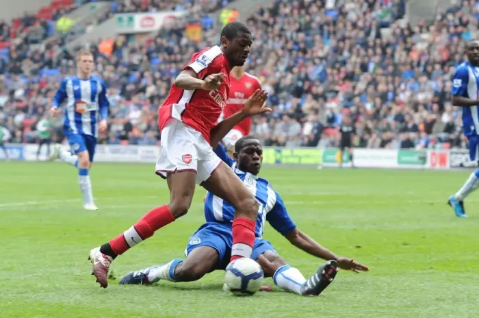 Framed Print : Diaby vs. Figueroa: Wigan Athletic's Upset Over Arsenal (3-2)