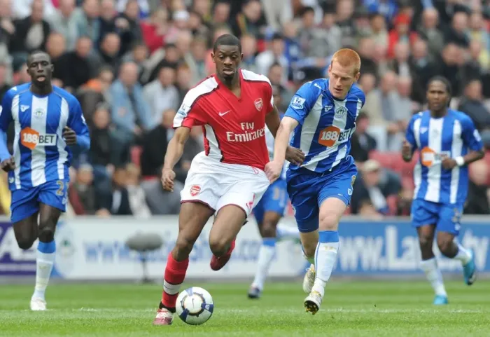 Framed Print : Diaby vs Watson: Wigan Athletic's Upset over Arsenal in FA Premier League (3:2)