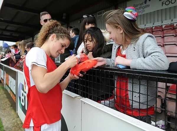 Dominique Janssen of Arsenal Ladies Signs Autographs after FA Cup Match against Tottenham Hotspur Ladies