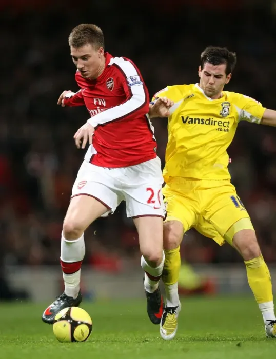 Framed Print : Double Trouble: Bendtner's Brace Powers Arsenal Past Cardiff in FA Cup Showdown Framed Print : Double Trouble: Bendtner's Brace Powers Arsenal Past Cardiff in FA Cup Showdown