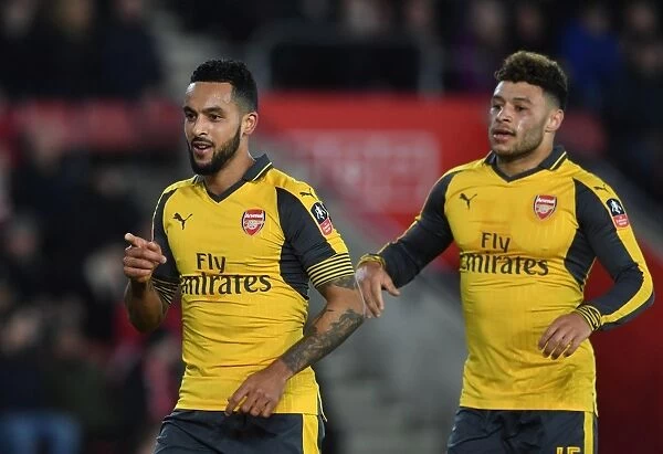Double Trouble: Walcott and Oxlade-Chamberlain's FA Cup Goals Lead Arsenal to Victory over Southampton