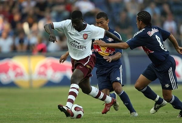 Eboue Face-off: Arsenal's Emmanuel vs. Salzburg's Alex in 2007 Pre-Season Clash