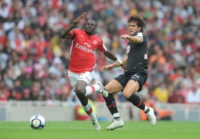 Framed Print : Eboue vs. Dominguez: A Clash at the Emirates Cup, 2009: Arsenal's Victory over Athletico Madrid (2-1) Framed Print : Eboue vs. Dominguez: A Clash at the Emirates Cup, 2009: Arsenal's Victory over Athletico Madrid (2-1)