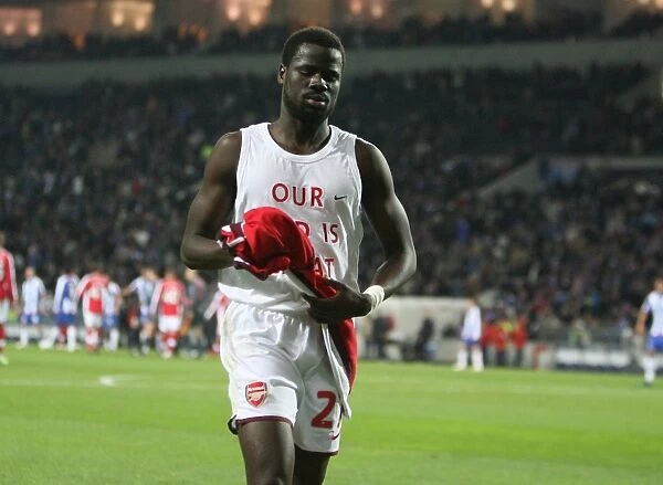 Eboue's Emotional Moment: Arsenal Defender Throws Shirt to Adoring Fans after FC Porto Defeat