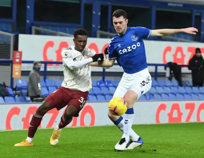 Framed Print : Eddie Nketiah vs Michael Keane: Intense Battle at Goodison Park - Everton vs Arsenal, Premier League 2020-21