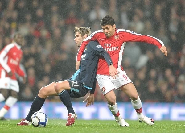 Eduardo (Arsenal) Valon Behrami (West Ham). Arsenal 2:0 West Ham United