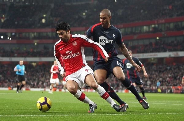 Eduardo (Arsenal) Zat Knight (Bolton). Arsenal 4: 2 Bolton Wanderers. Barclays Premier League