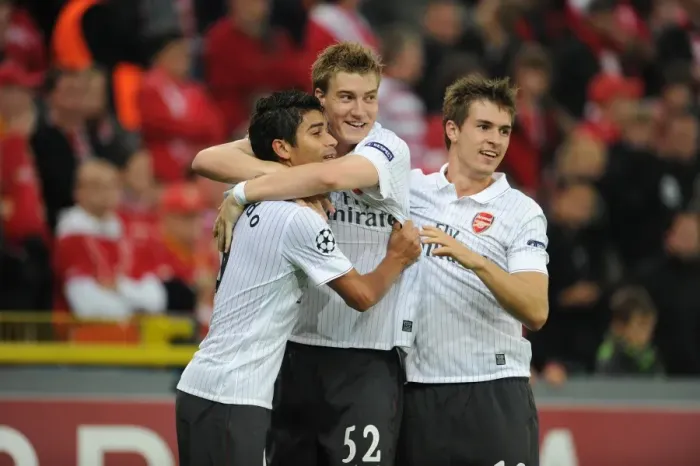 Framed Print : Eduardo, Bendtner, and Ramsey: Celebrating Arsenal's 3rd Goal Against Standard Liege in the UEFA Champions League Framed Print : Eduardo, Bendtner, and Ramsey: Celebrating Arsenal's 3rd Goal Against Standard Liege in the UEFA Champions League