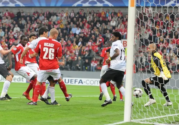 Framed Print : Eduardo celebrates hits the ball past Liege goalkeeper