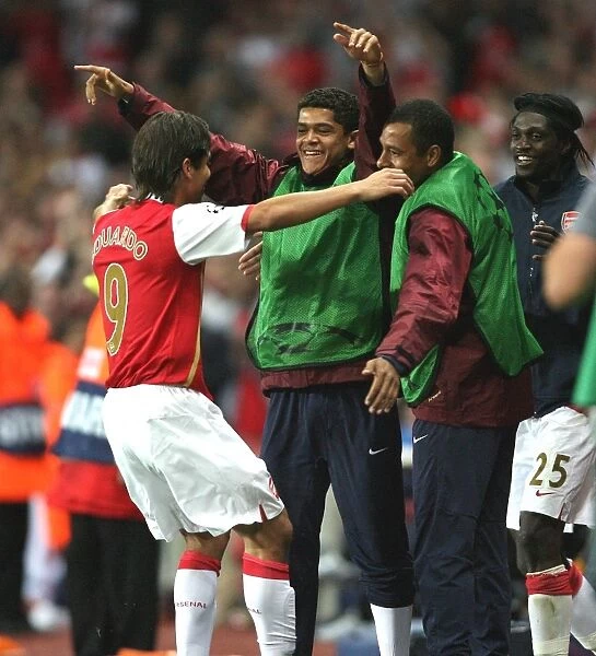 Eduardo celebrates scoring the 3rd Arsenal goal with Denilson and Gilberto