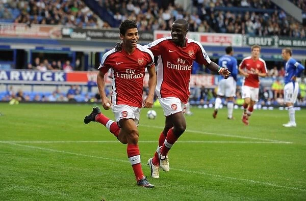 Eduardo celebrates scoring the 6th Arsenal goal with Emmanuel Eboue