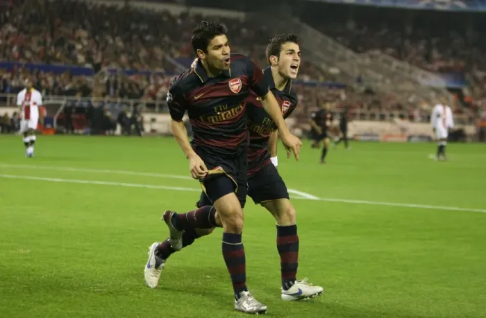 Framed Print : Eduardo and Cesc Fabregas: Celebrating Arsenal's Goal in Seville, UEFA Champions League (3:1)