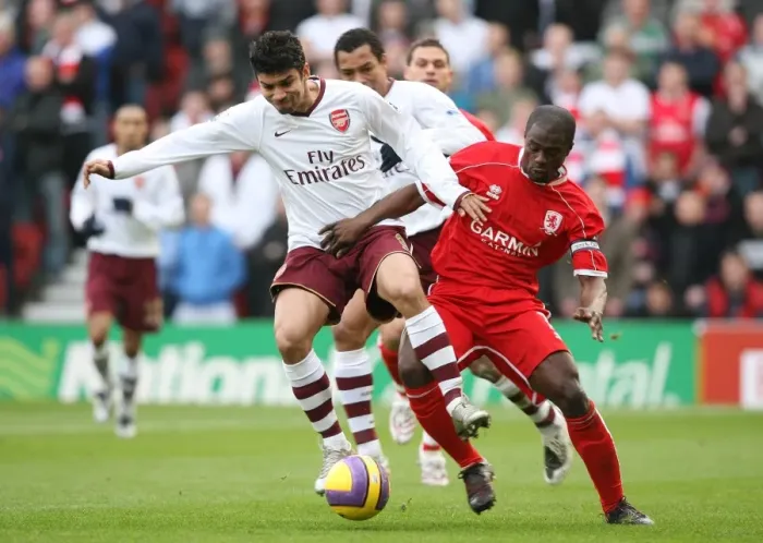 Framed Print : Eduardo vs. George Boateng: A Battle at Riverside Stadium - Middlesbrough Edge Past Arsenal 2:1 in Premier League Framed Print : Eduardo vs. George Boateng: A Battle at Riverside Stadium - Middlesbrough Edge Past Arsenal 2:1 in Premier League