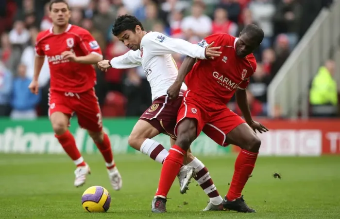 Framed Print : Eduardo vs. George Boateng: A Rivalry Unfolded - Middlesbrough's 2:1 Victory over Arsenal in the Barclays Premier League
