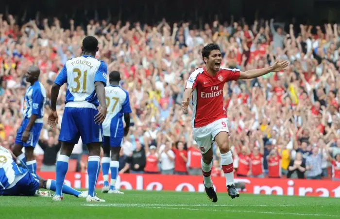 Framed Print : Eduardo's Delight: Emmanuel Eboue Scores Arsenal's Third Goal in 4-0 Victory over Wigan Athletic