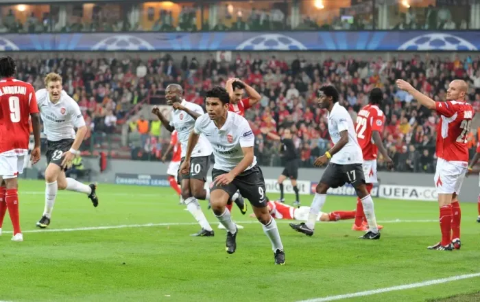 Framed Print : Eduardo's Game-Changing Goal: Arsenal's 3-2 Lead Over Standard Liege in the UEFA Champions League Framed Print : Eduardo's Game-Changing Goal: Arsenal's 3-2 Lead Over Standard Liege in the UEFA Champions League