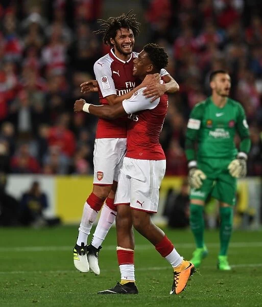 Elneny and Iwobi Celebrate Arsenal's Third Goal Against Western Sydney Wanderers