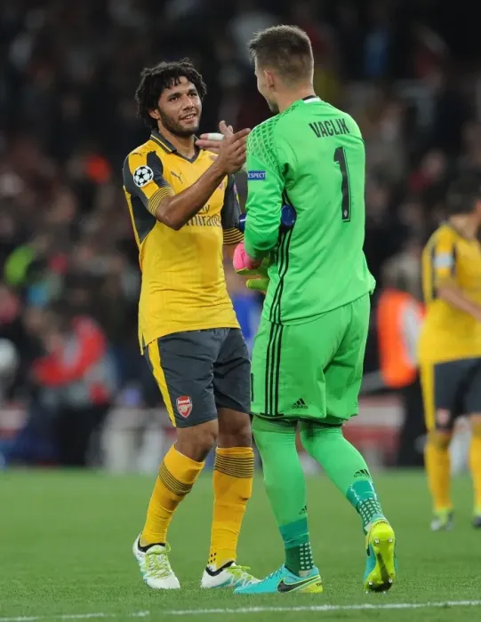 Framed Print : Elneny and Vaclik: A Moment of Sports Camaraderie after Arsenal-Basel UEFA Champions League Clash
