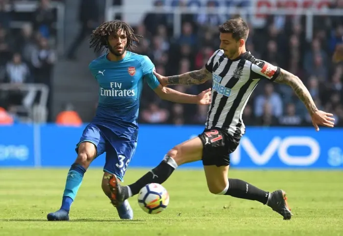 Framed Print : Elneny vs Joselu: Intense Battle in Newcastle United vs Arsenal Premier League Clash Framed Print : Elneny vs Joselu: Intense Battle in Newcastle United vs Arsenal Premier League Clash