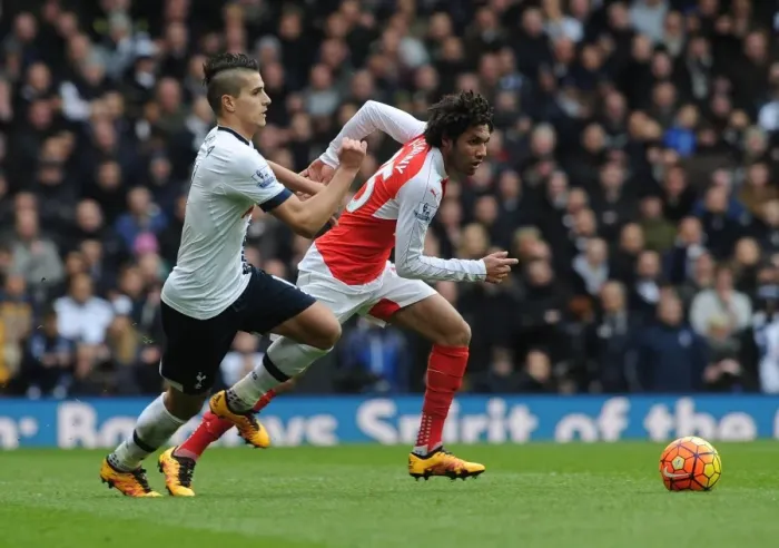 Framed Print : Elneny vs. Lamela: A Premier League Showdown - Arsenal vs. Tottenham