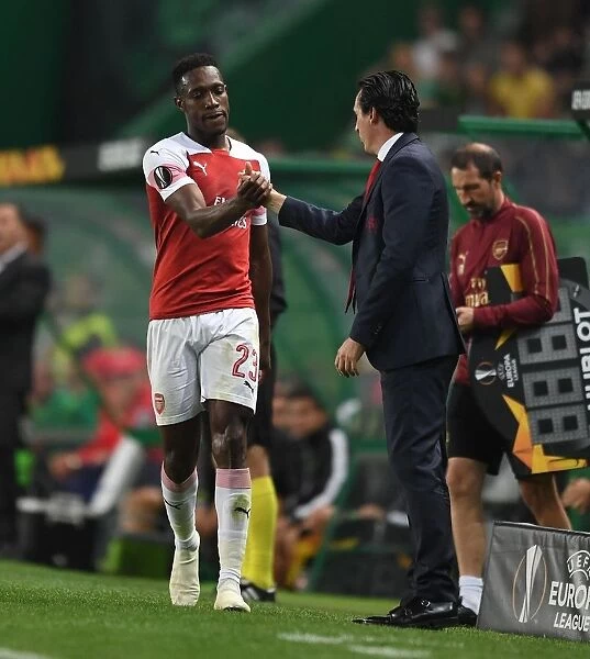 Emery and Welbeck: A High Five Moment at the Europa League Clash between Sporting Lisbon and Arsenal