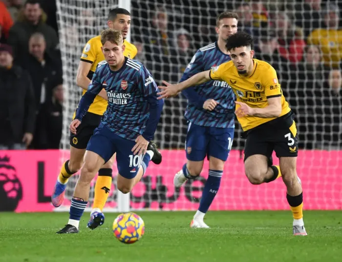 Framed Print : Emile Smith Rowe Breaks Past Wolves Rayan Ait-Nouri: Wolverhampton Wanderers vs Arsenal, Premier League 2021-22