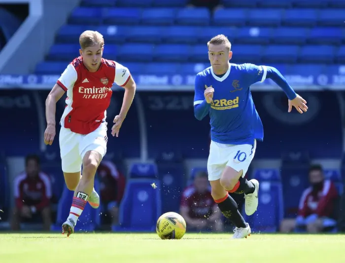 Framed Print : Emile Smith Rowe Clashes with Rangers: Arsenal's Pre-Season Battle at Ibrox Stadium