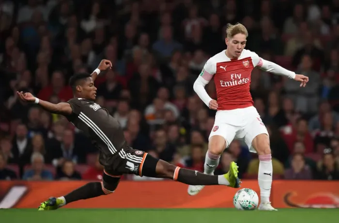 Framed Print : Emile Smith Rowe Outmaneuvers Julian Jeanvier in Arsenal's Carabao Cup Clash Framed Print : Emile Smith Rowe Outmaneuvers Julian Jeanvier in Arsenal's Carabao Cup Clash