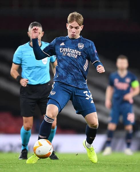 Emile Smith Rowe Shines in Empty Emirates: Arsenal's Standout Performance Against Rapid Wien in the Europa League 2020-21