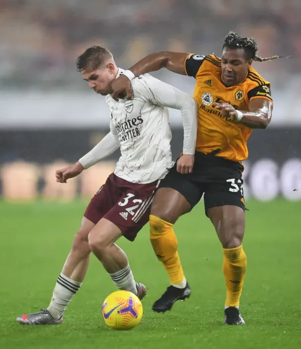 Framed Print : Emile Smith Rowe vs Adama Traore: Intense Battle at Wolverhampton Wanderers vs Arsenal, Premier League 2020-21
