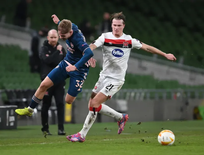 Framed Print : Emile Smith Rowe vs Dan Cleary: Clash in UEFA Europa League Match between Dundalk and Arsenal Framed Print : Emile Smith Rowe vs Dan Cleary: Clash in UEFA Europa League Match between Dundalk and Arsenal