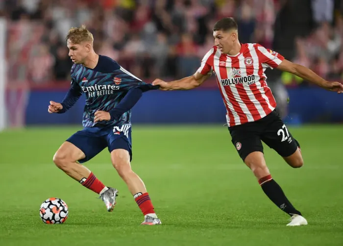 Framed Print : Emile Smith Rowe vs. Vitaly Janelt: Battle in the Premier League - Brentford vs. Arsenal (2021-22) Framed Print : Emile Smith Rowe vs. Vitaly Janelt: Battle in the Premier League - Brentford vs. Arsenal (2021-22)