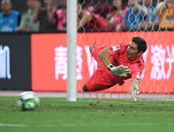 Emiliano Martinez's Heroics: Arsenal Defeat Bayern Munich in Shanghai Shootout