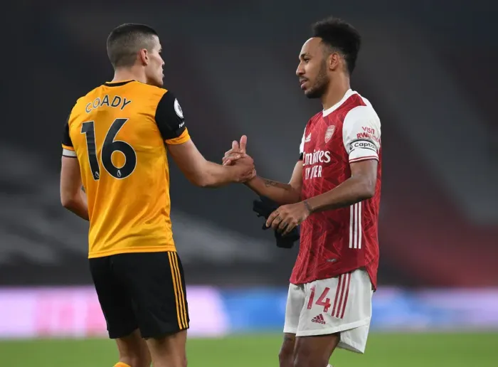Framed Print : Empty Emirates: Aubameyang and Coady's Unique Handshake - Arsenal vs. Wolverhampton Wanderers Amidst Pandemic Restrictions (Premier League 2020-21) Framed Print : Empty Emirates: Aubameyang and Coady's Unique Handshake - Arsenal vs. Wolverhampton Wanderers Amidst Pandemic Restrictions (Premier League 2020-21)
