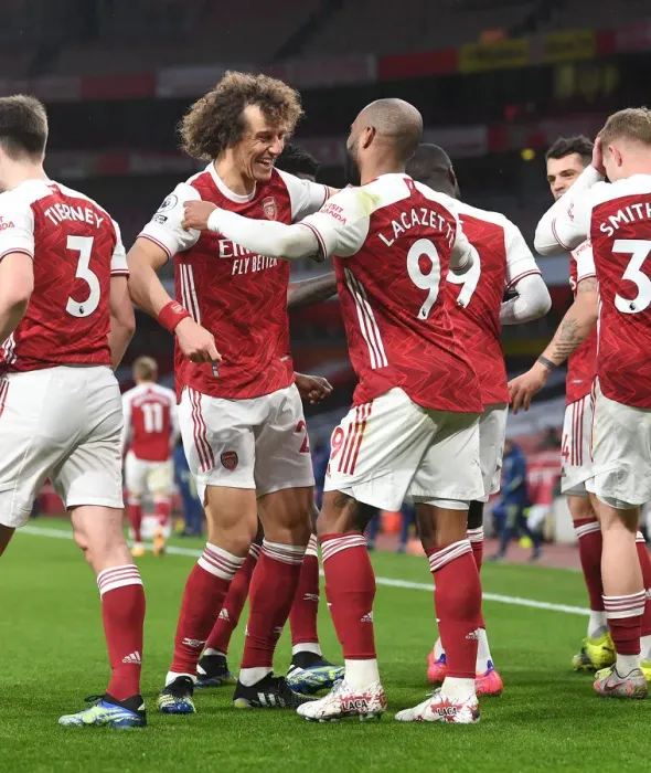 Framed Print : Empty Emirates: Lacazette and David Luiz's Jubilant Moment as Arsenal Defeats Tottenham (2020-21)