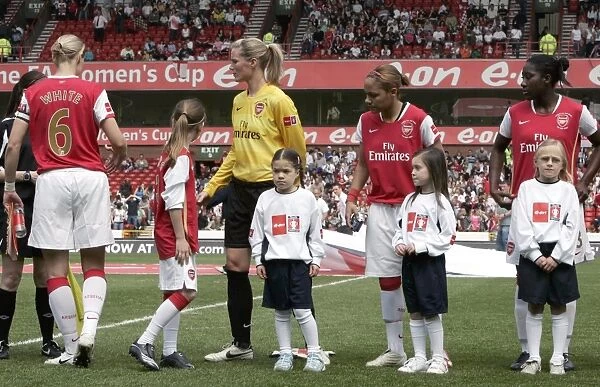 Emma Byrne (Arsenal) with mascots