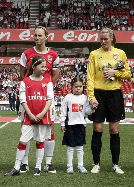 Emma Byrne and Faye White with the mascots